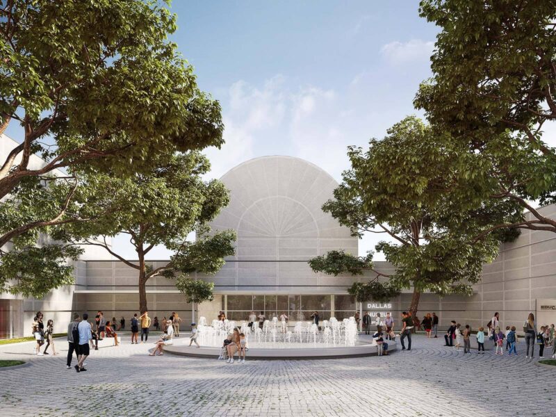 Render of a tree-shaded courtyard with a circular fountain in front of the museum's arched, perforated facade