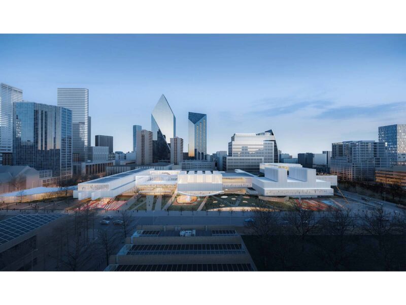 Dusk render of Michael Maltzan Architecture's design, a low undulating white structure with illuminated interior set against the Dallas skyline