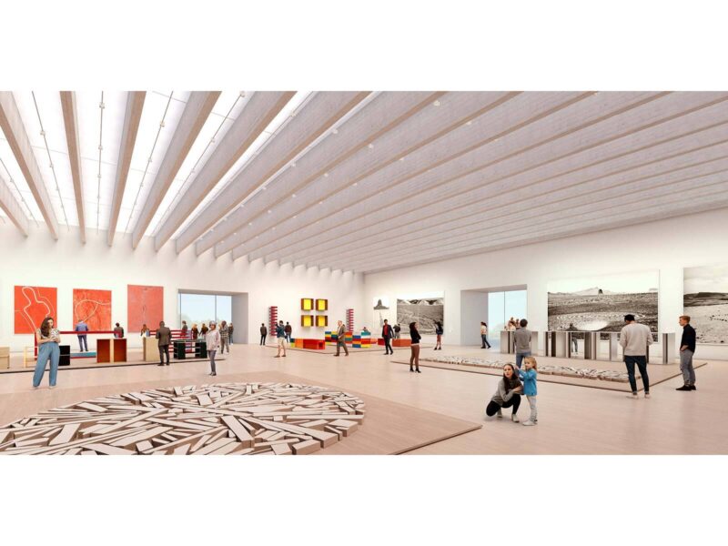 Render of a daylit gallery interior with timber ceiling beams, visitors viewing artworks including large photographic prints and colorful sculptural pieces
